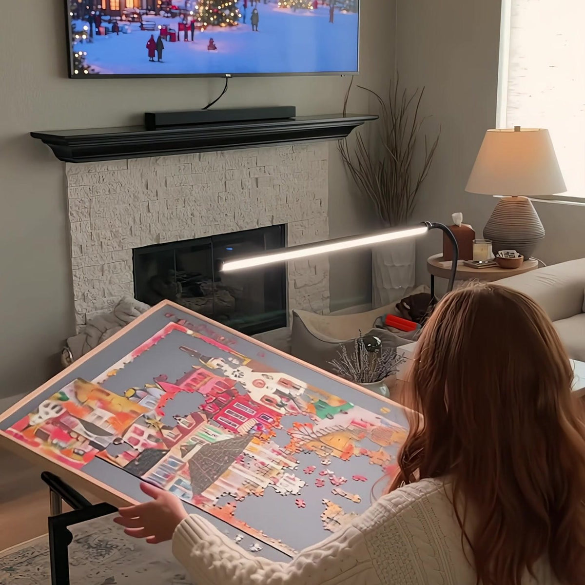 Board tilted toward her on the couch
